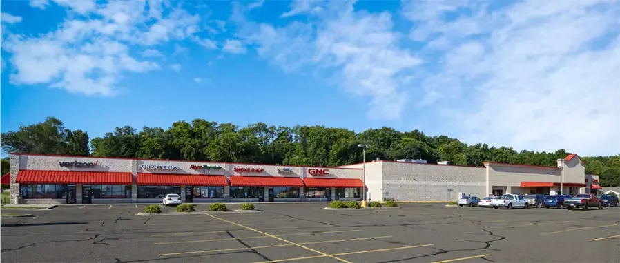 strip mall with an empty parking lot